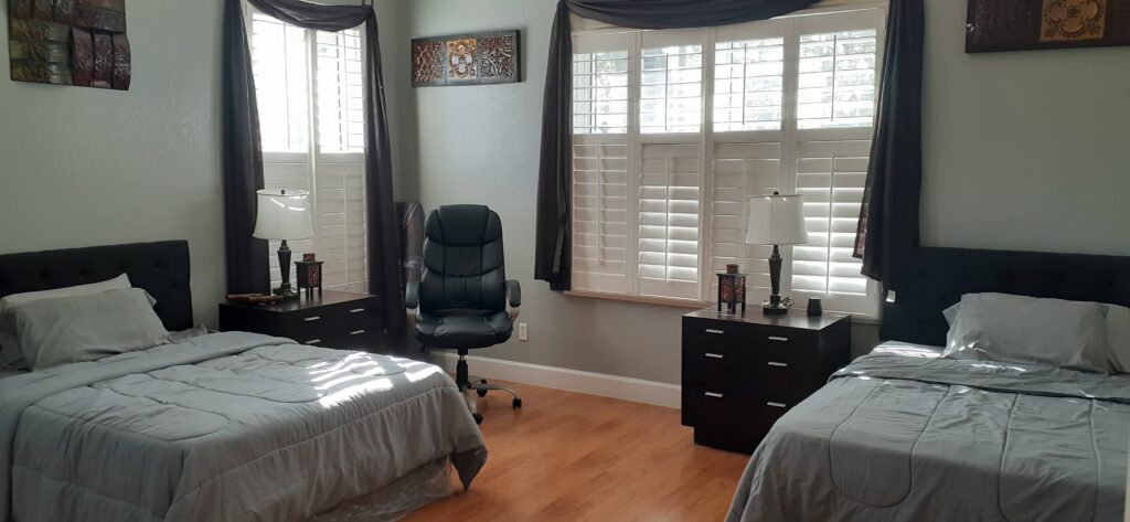 An open kitchen and dining area with clearly marked safety features.